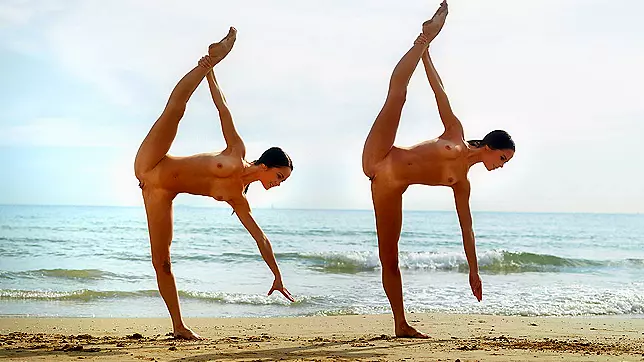Two in nature's garb twin sisters in an erotic massage after nude gymnastic exercises